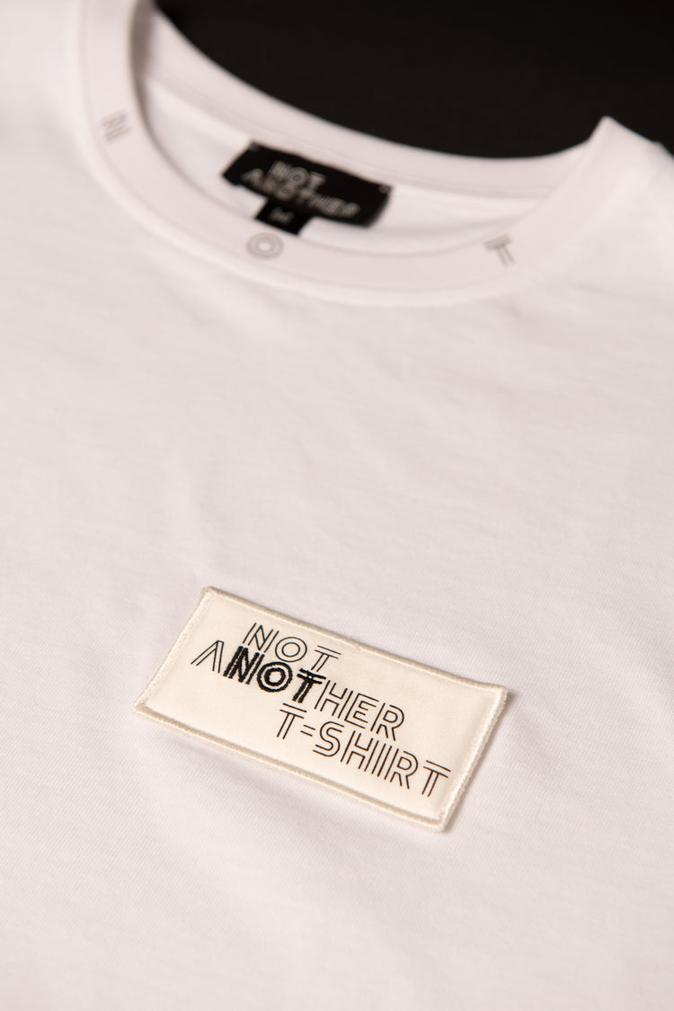 Unisex White Sustainable Recycled cotton Signature T-Shirt removable branded patch to swap with crystal patch